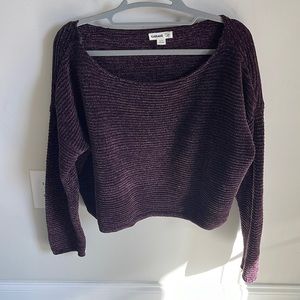 Eggplant colored sweater, loose fitting.